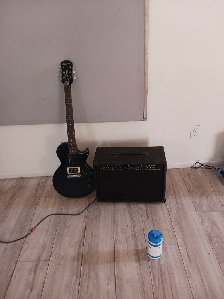 Electric Guitar With Amplifier 