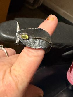 Perido on a silver leaf ring