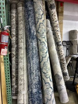 Assorted used area Rugs
