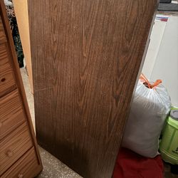 FOLDING TABLE  45 1/2"w x 27"deep; heavy; 2 cushions on the feet need to be replaced; cross  streets are Arapaho & Waterview