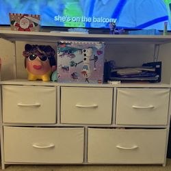 White cubby-like drawers, dresser 