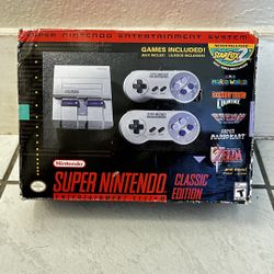VINTAGE SUPER NINTENDO WITH GAMES AND CONTROLLERS 