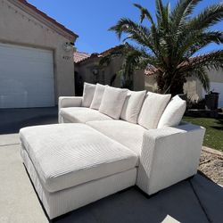 Like New 102" L-Shaped Sectional Sofa with Deep Seats and Loose Back, Oversized Beige Corduroy 