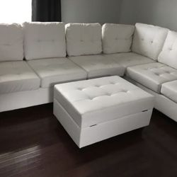 White Sectional And Ottoman
