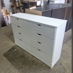 Eight drawers dresser with rails