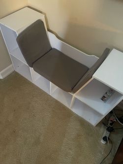 Kids books shelves with seating for child to read