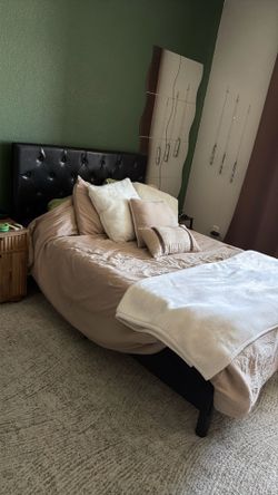 Full size bed frame and mattress with vegan leather headboard