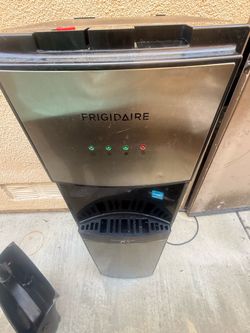 Water cooler dispenser with heater Frigidaire working