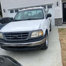 Ford  F 150.  115000 Mil.   Clean Title.  Good Work. 