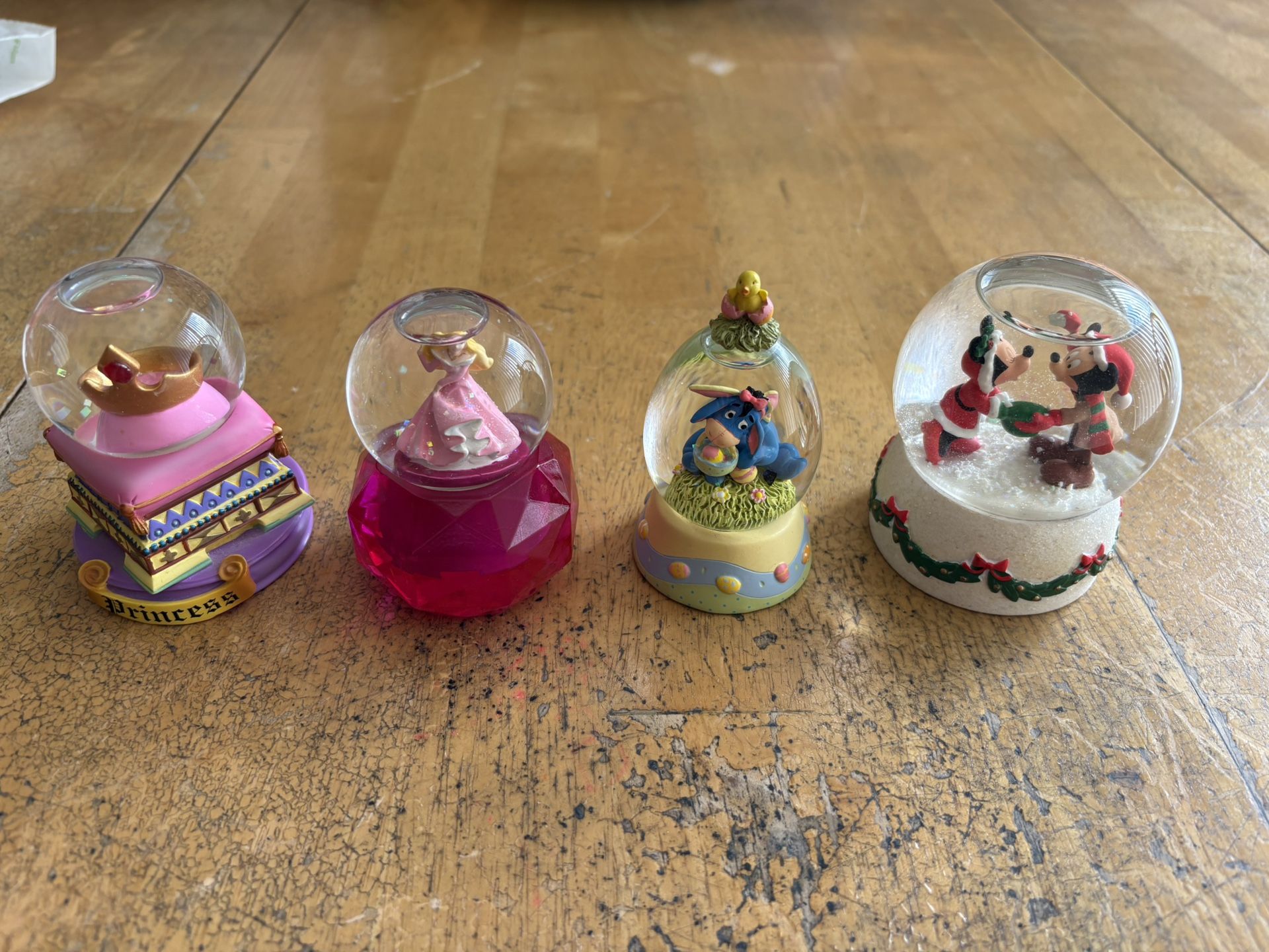 4 Small Disney Snow Globes