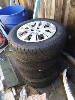 Toyota wheels 4 nut holes with like new tires 300 obo make me an offer