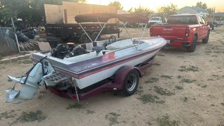 Small fishing boat with the mercury motor