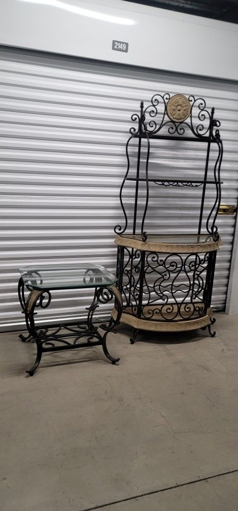 Bombay Company glass & metal bakers rack. Offers glass & bottle storage. Nice find for a kitchen or dining room. 38"wide x 16"deep x 76"high. Like New