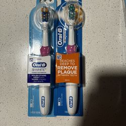 2 Oral B toothbrushes and 1 Equate Total care kit