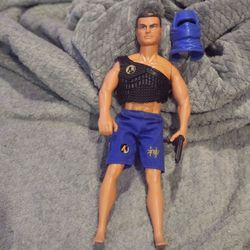 Action Man Eagle Eyes Ninja figure in a blue outfit.