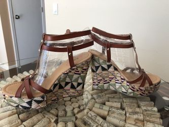 Brown/tan wedge heels size 7.5