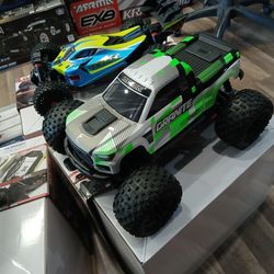 RC Monster Truck Brushed Electric 1/10 Scale 4x4 Including A Remote Controller