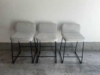 Ashley future Nerison Counter height linen griege upholstered modern bar stools.