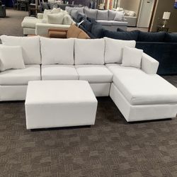 White Cream Sectional Couch And Ottoman 