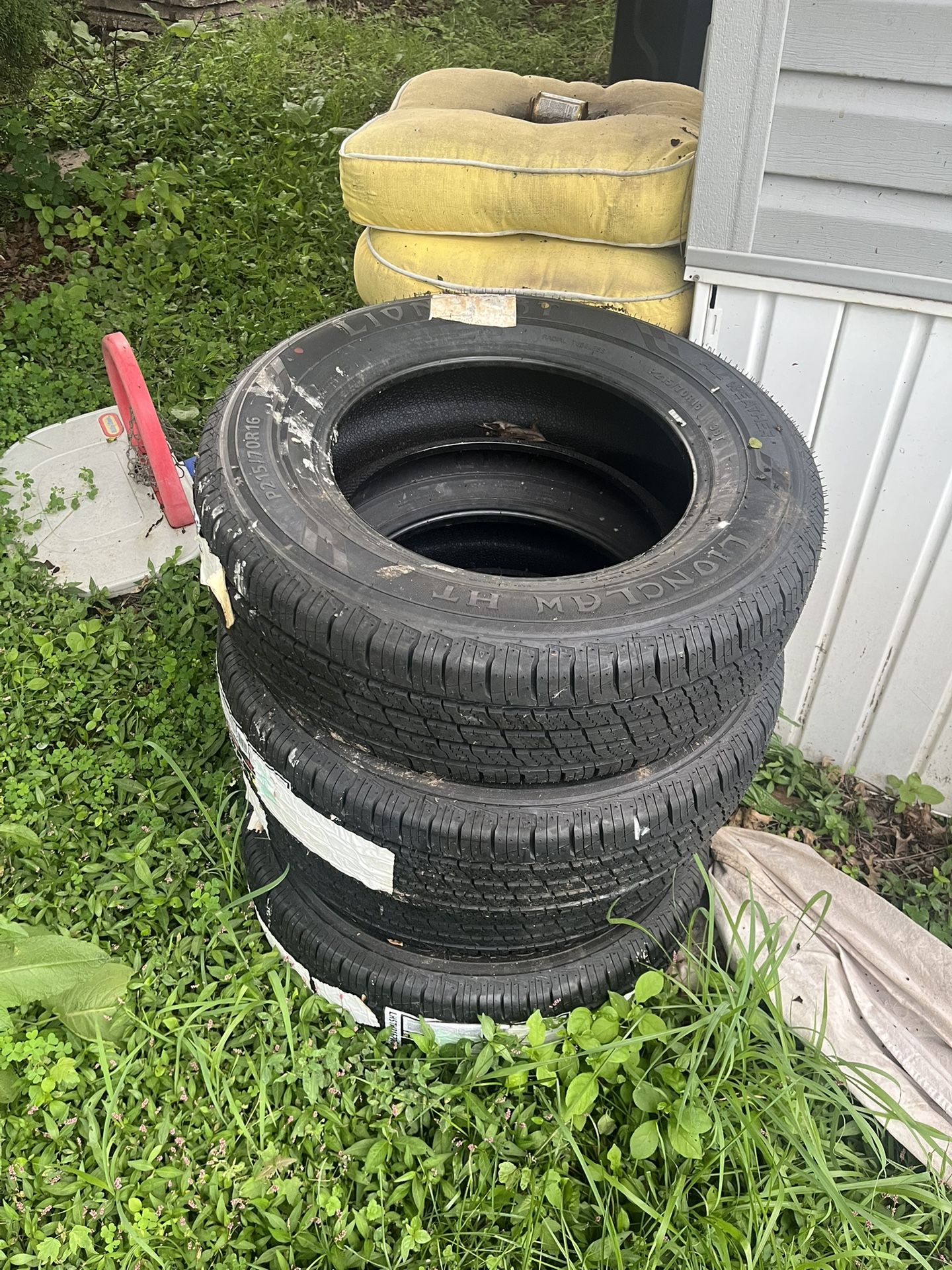 New Tire/ P215 70R16