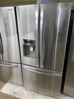 Kenmore 33 inch wide good condition we delivery