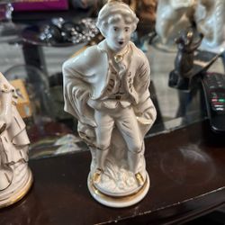 A pair of porcelain figurines