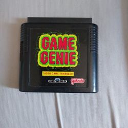 Game genie for sega genesis Code book included.
Somewhat o k condition