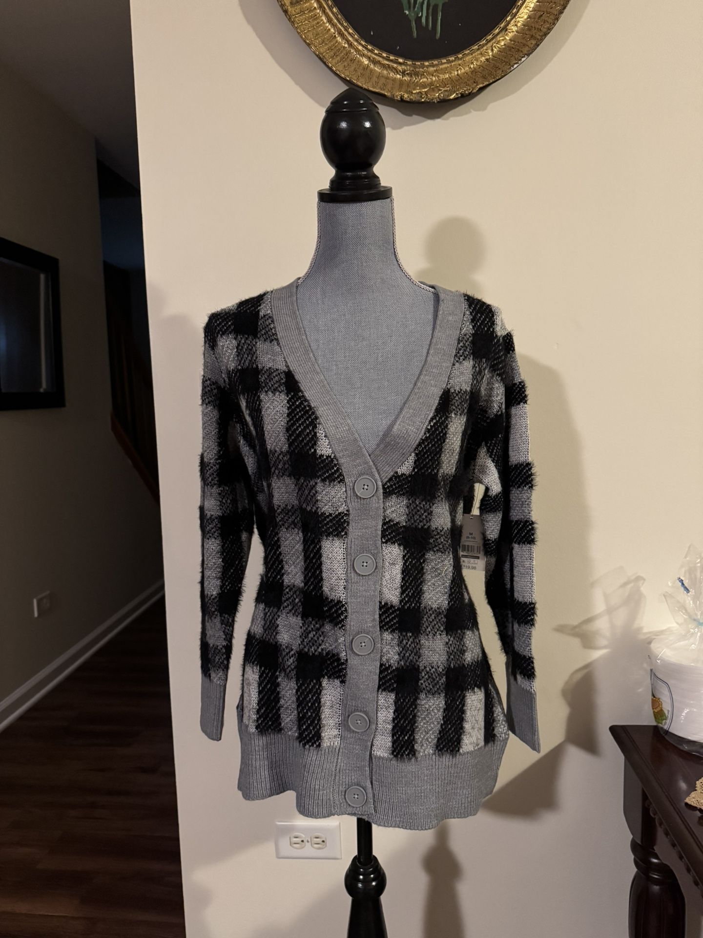 Ladies, cardigan, soft, and warm size medium new with tags