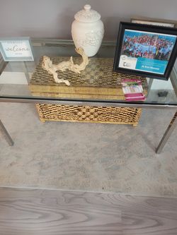 Glass coffee table with chrome frame