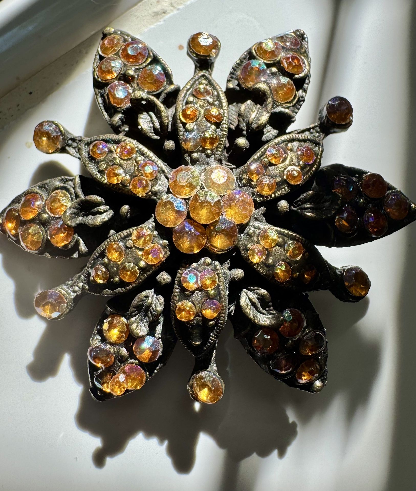 BROOCH Antique Black Metal Flower Amber Color Rhinestones 2” Diameter