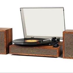 Vintage vinyl record player with speakers