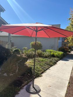 Outdoor Patio Umbrella with Decorative Stand $25