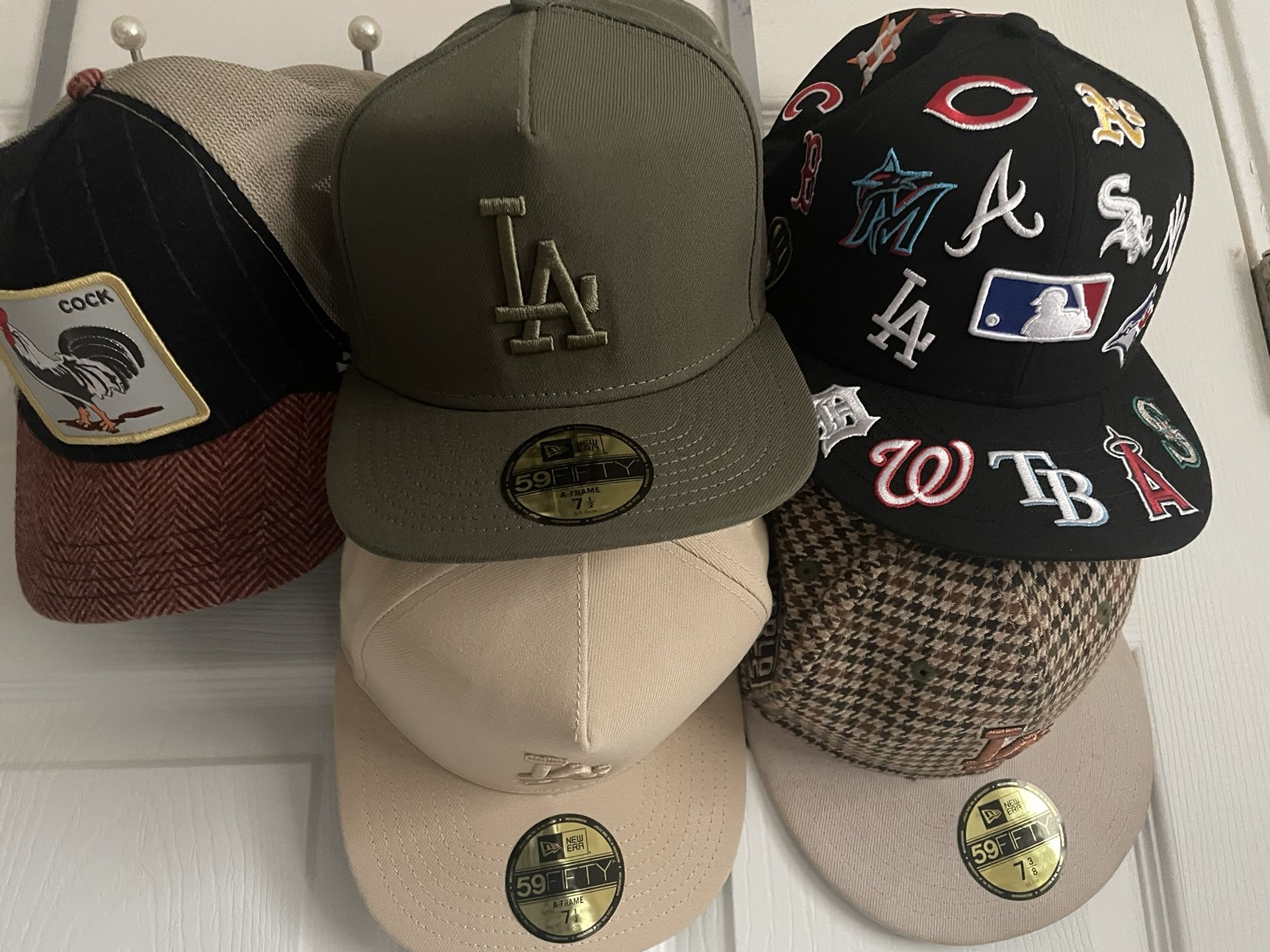 New Era caps in the following sizes as shown in the photos