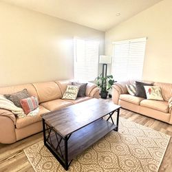 Light Pink Leather Couch And Coffee Table 