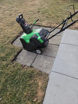 Lawn boy 20 inch snow thrower made by Toro used only once has been in storage