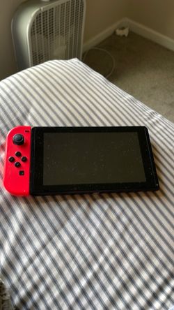 Nintendo Switch with Red Joy-Con (broken)