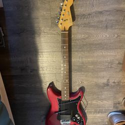 Fender Electric Guitar With Black Hard Plastic Fender Guitar Case