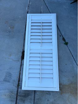 Faux wood shutters