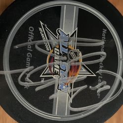 DiPietro Islanders Signed Puck