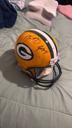 Signed and authenticated Brett farve and Aaron Rodger’s