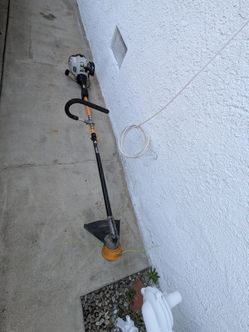 Tuned up working Ryobi 30cc 2 cycle string trimmer