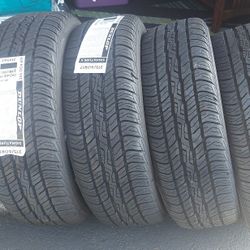 TIRE SET. 4  NEW DUNLOP SIGNATURE II TIRES  ( 215/60 R17 ) ASKING FOR $300. NO LONGER NEEDS THESE SIZE. THE LAST PICTURES LISTED FOR ORIGINAL PRICE 