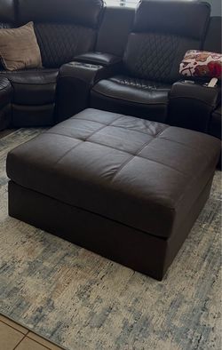 Overstuffed brown ottoman