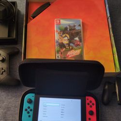 Nintendo Switch With Ring Fit And 3 Controllers