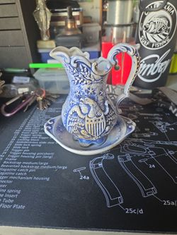 Ceramic Pitcher and Saucer with Eagle Motif