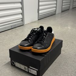 RAF SIMONS x ADIDAS STAN SMITH ‘BLACK ORANGE’