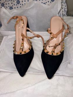 Black and nude gold studded heels