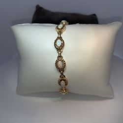 14K yellow gold lady’s opal fancy bracelet 