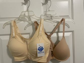 Two women’s Beige/Cream Bras