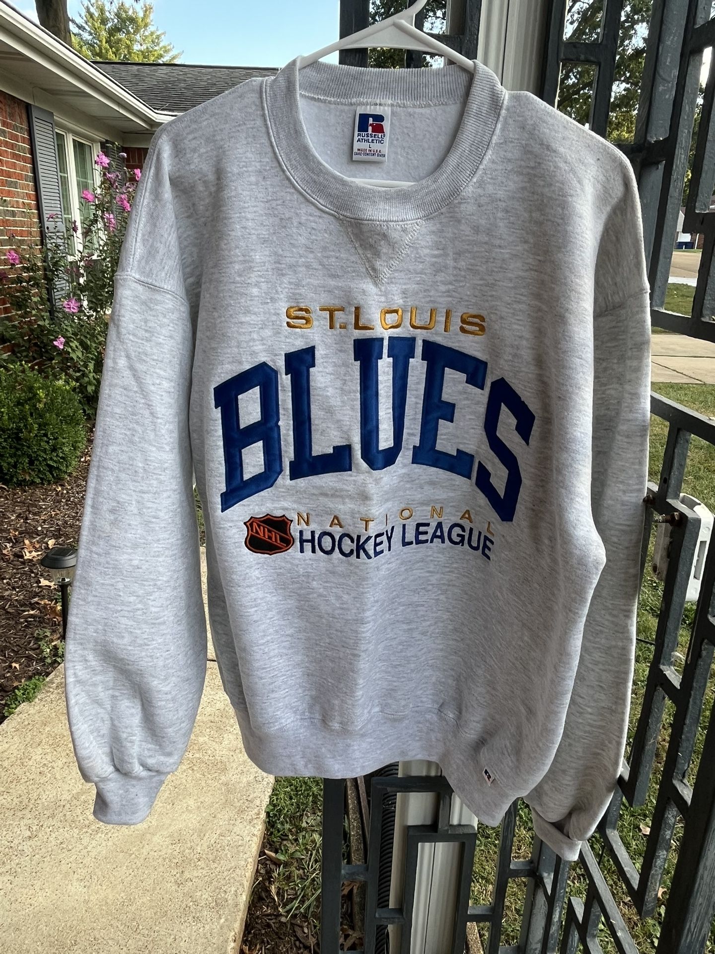 Vintage 1990s St. Louis Blues NHL crewneck sweatshirt by Russell Athletic.